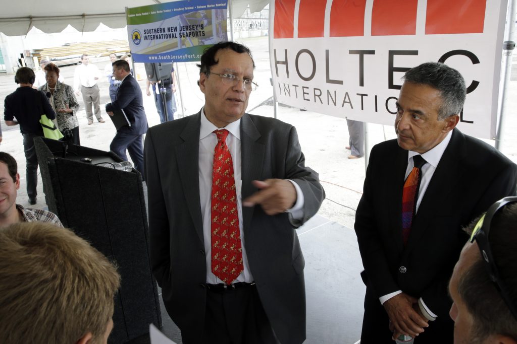 Kris Singh Kris Singh, center, the founder, president and CEO of Holtec International. The company was granted the second-largest tax break in state history, but officials placed a hold on the break following our reporting. (Mel Evans/AP Photo)