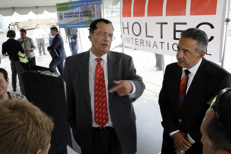 Kris Singh, center, the founder, president and CEO of Holtec International. The company was granted the second-largest tax break in state history, but officials placed a hold on the break following our reporting. (Mel Evans/AP Photo)