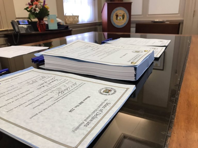 Gov. John Carney signed Delaware’s $4.45 billion budget Tuesday afternoon in his Dover office. (Courtesy of Carney staff)