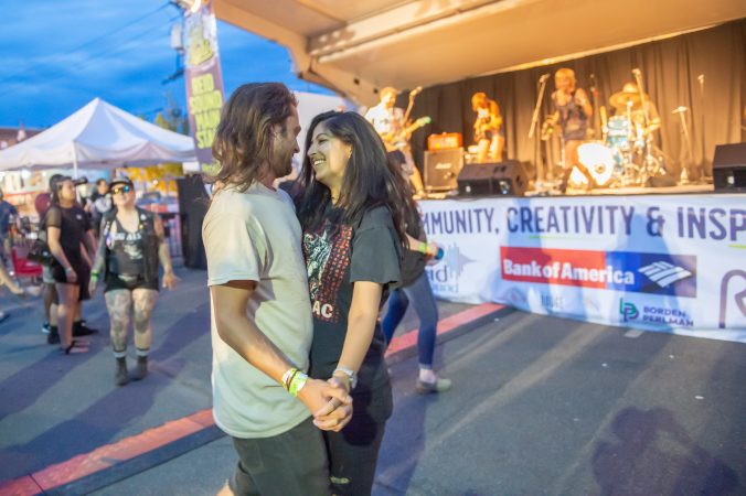 Josh Farber and Molli Byrn dance to the band Molly Rhythm. (Jonathan Wilson for WHYY)