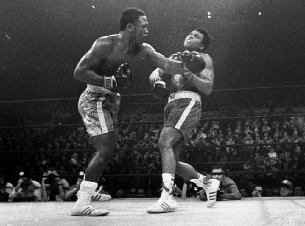 ALI FRAZIER Joe Frazier hits Muhammad Ali with a left during the 15th round of their heavyweight title fight at New York's Madison Square garden in this March 8, 1971 photo. (AP Photo/stf)