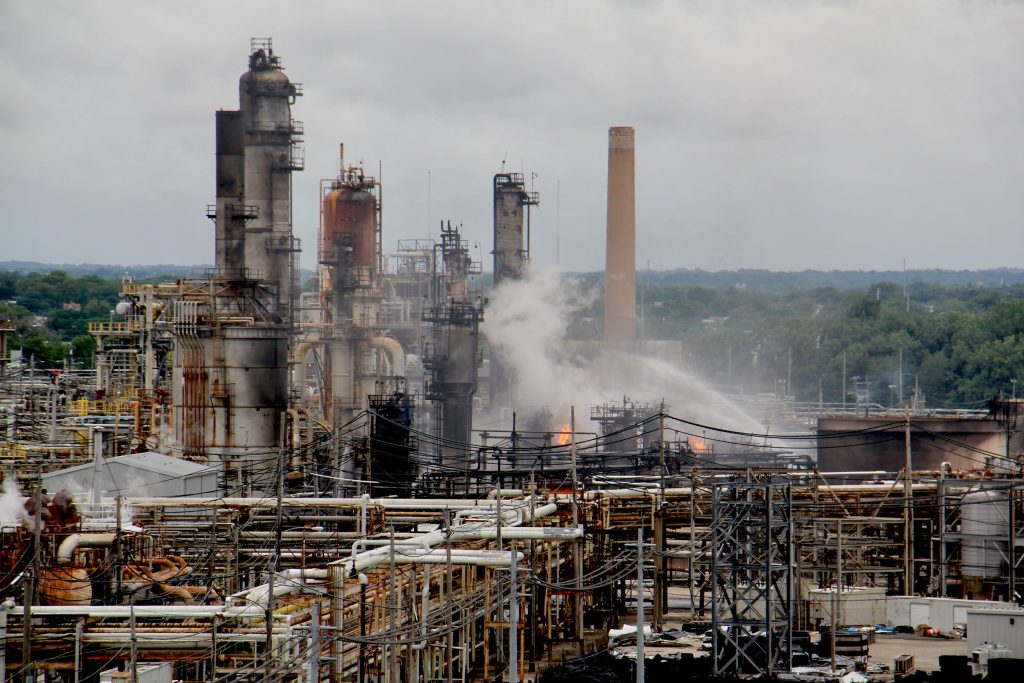 Image uploaded from iOS (4) Fire fighters battle flames at the PES refinery in June 2019. (Emma Lee/WHYY)