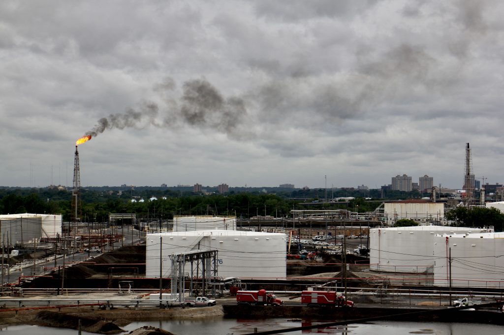 Image uploaded from iOS (5) Smoke rising from the refinery