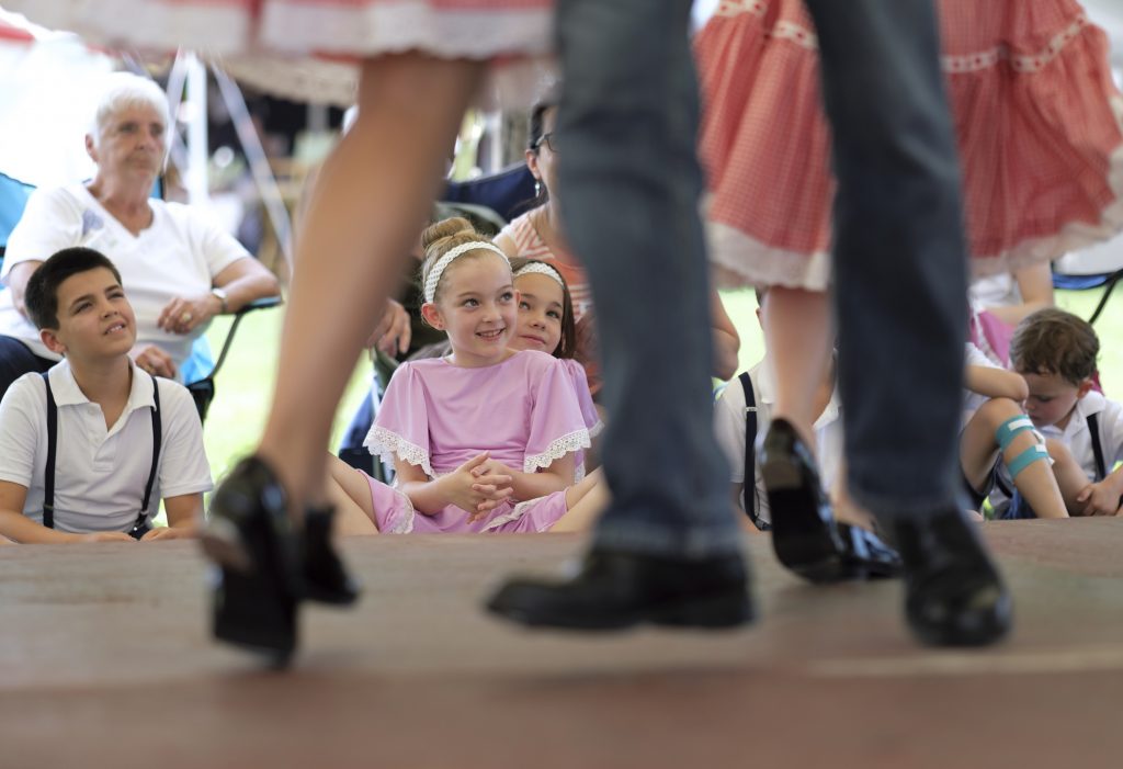 Miller Family Hoedown Jayda Rutherford (center) watches as older family members perform in the Miller Family Hoedown on July 1, 2018, during the Kutztown Folk Festival in Kutztown, Pennsylvania. (Matt Smith for WHYY)