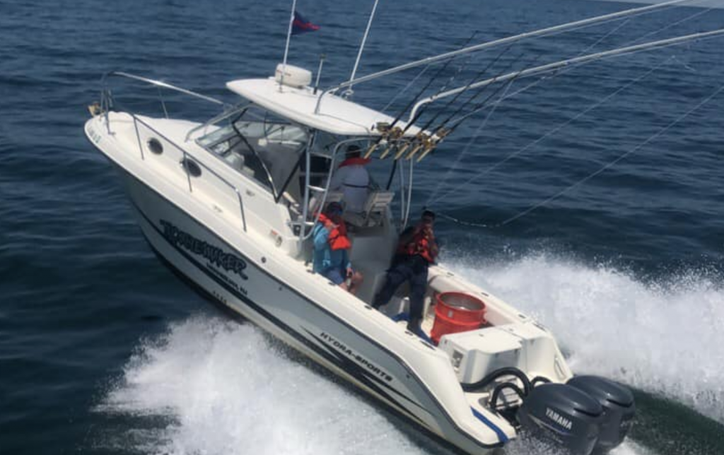 Screen Shot 2019-06-26 at 5.41.33 PM A Coast Guard member aboard the vessel