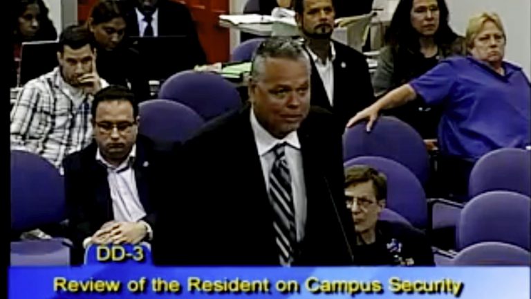 In this 2015 photo, then-school resource officer Scot Peterson spoke at a school board meeting of Broward County in Florida. Peterson was arrested on Tuesday and faces 11 charges in the wake of the Marjory Stoneman Douglas High School shooting. (Broward County Public Schools via AP)