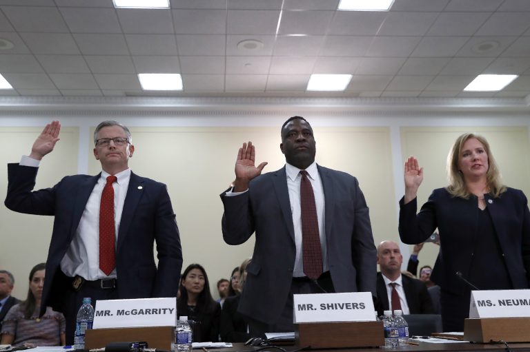 Michael McGarrity, FBI Assistant Director of the Counterterrorism Division; Calvin Shivers, FBI Deputy Assistant Director in the Criminal Investigative Division; and Elizabeth Neumann, an assistant secretary at the Department of Homeland Security, answer lawmakers' questions on Tuesday about the Trump administration's response to far-right extremism. (Jacquelyn Martin/AP)