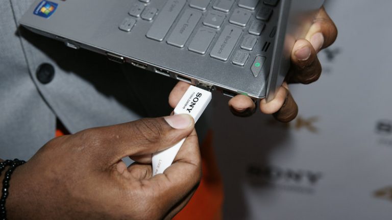 Because the plug isn't reversible, connecting a USB device to a computer can often be a frustrating experience. (Joe Kohen/Invision/AP) 