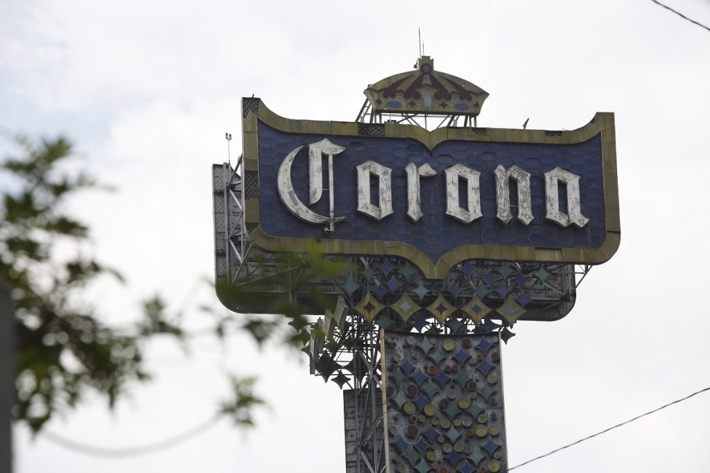 Mexico US Tariffs A Corona beer billboard is displayed at the Grupo Modelo beer factory, maker of Corona beer, in Mexico City, Mexico, Friday, May 31, 2019. If the tariffs threatened by United States President Donald Trump on Thursday were to take effect, they could eventually raise prices in the US, for a new Chevrolet Blazer SUV, a burrito at Chipotle, a new shirt or a Corona beer. (AP Photo/Ginnette Riquelme)