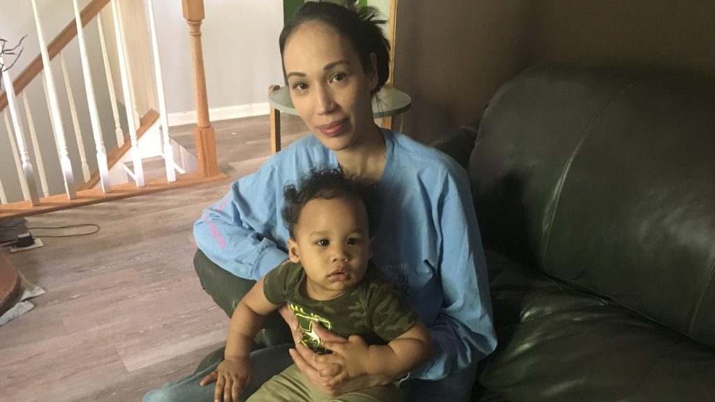 Natalie Lynch at home with her youngest child, Maycen. In 2014, when Lynch was pregnant with her older child, she spent two weeks before giving birth in a prison cell, mostly alone. Natalie Lynch at home with her youngest child, Maycen. In 2014, when Lynch was pregnant with her older child, she spent two weeks before giving birth in a prison cell, mostly alone. (Sarah McCammon/NPR)