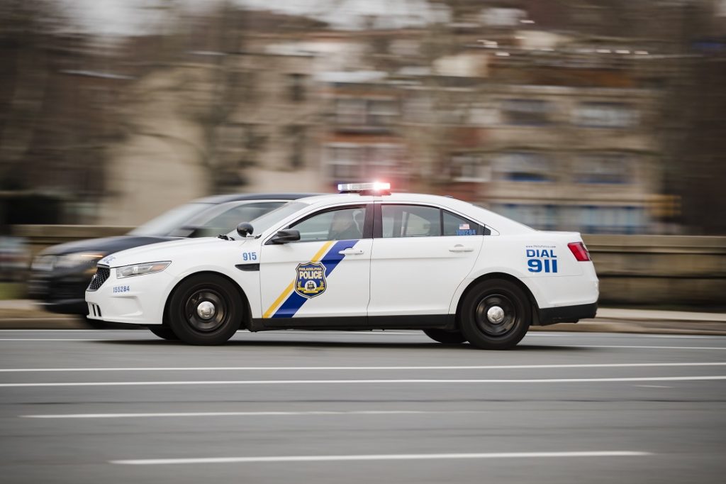 Philadelphia Police A police car drives with its lights flashing in Philadelphia.