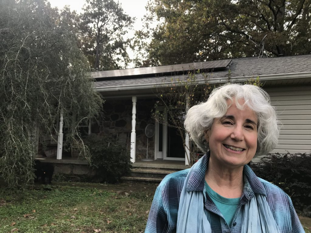 T.K. Thorne says the $20 monthly solar fee she pays to Alabama Power will double the time it will take to pay off her rooftop solar system. T.K. Thorne says the $20 monthly solar fee she pays to Alabama Power will double the time it will take to pay off her rooftop solar system. (Julia Simon for NPR)