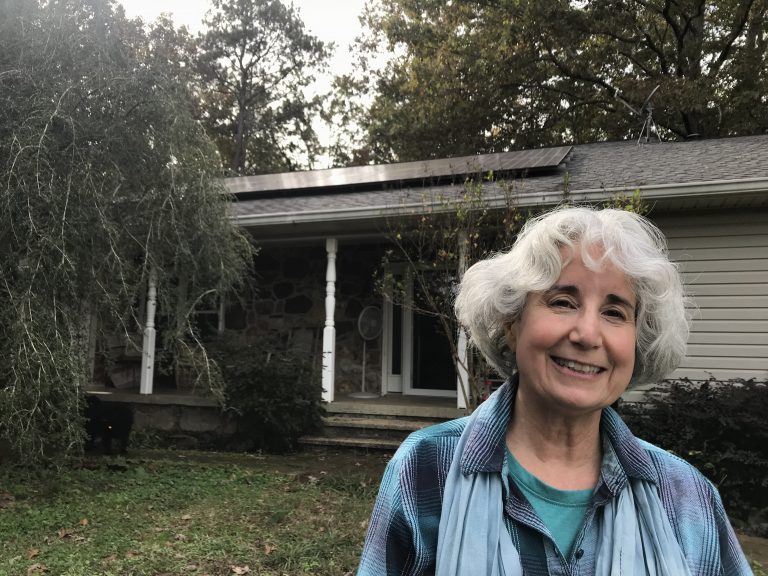 T.K. Thorne says the $20 monthly solar fee she pays to Alabama Power will double the time it will take to pay off her rooftop solar system. (Julia Simon for NPR)