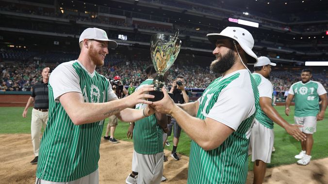 wentz_kelce_trophy-crop Carson Wentz and Jason Kelce at the second annual AO1 Charity Softball Game
(Brian Garfinkel/AO1 Foundation)