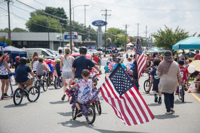The bike brigade makes their way through the annual Marple Newtown Fourth of July parade. (Emily Cohen for WHYY)