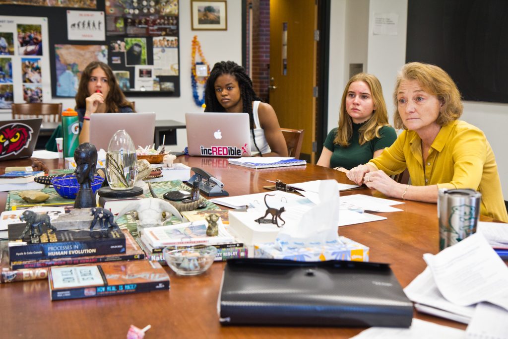 The Lawrenceville School teacher Leah Domb helps students discuss a lecture on race and biology by Penn professor Sarah Tishkoff. (Kimberly Paynter/WHYY)