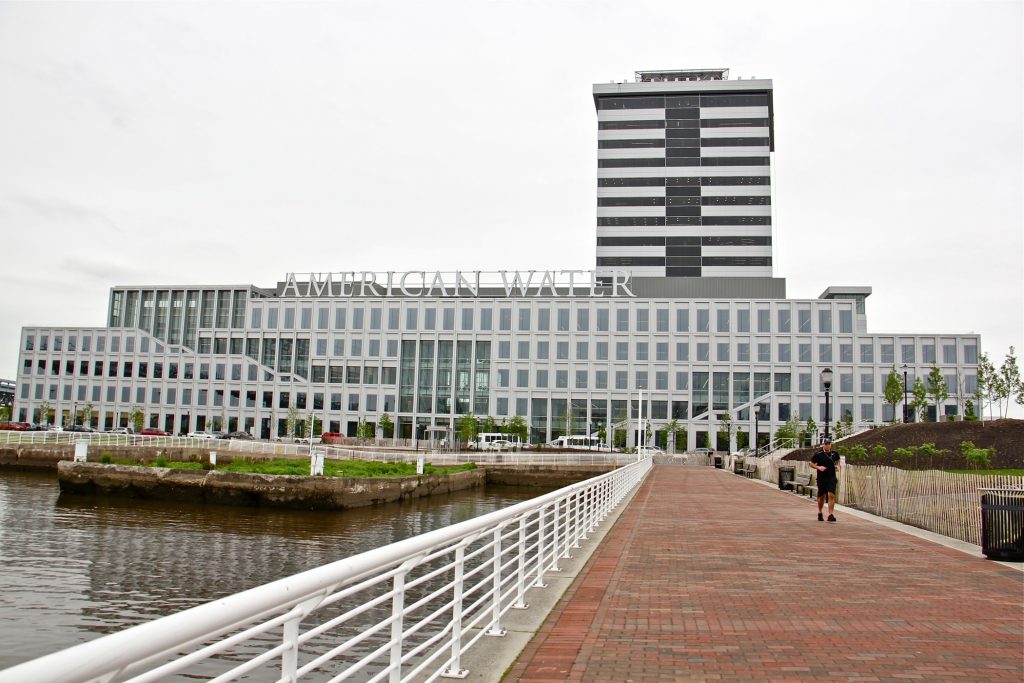 2019 05 09-e lee-camden waterfront Developments on the Camden waterfront, like the American Water corporate headquarters and the 18-story Camden Tower, receive substantial local tax breaks in addition to state tax incentives. (Emma Lee/WHYY)