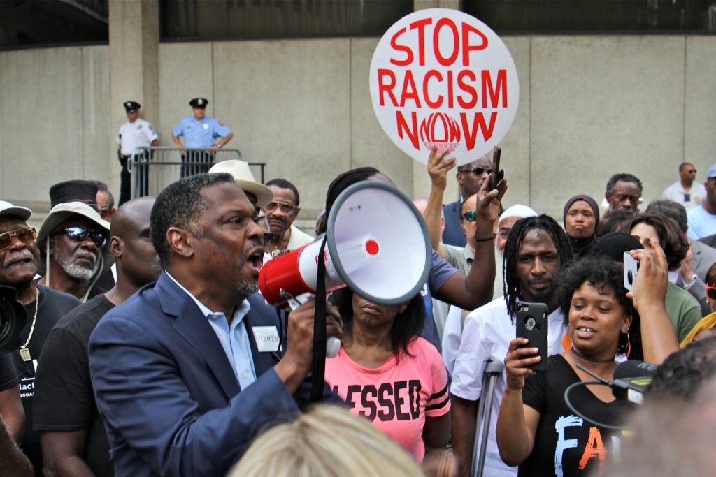 2019 06 07-e lee-philadelphia police headquarters-rallly protest against racist facebook posts About 200 protesters gather at Philadelphia police headquarters to call for action against police officers who posted racist comments on Facebook. (Emma Lee/WHYY)