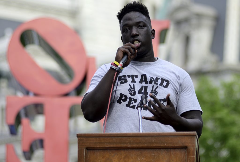 Anti Gun Violence Rally Draws Only Small Crowd in Love Park Cheick Diawara speaks during a Stand 4 Peace anti gun-violence rally in Love park (Bastiaan Slabbers for WHYY)