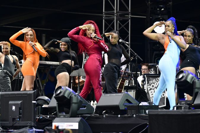 A female salute kicks off the program at the Welcome America festival on the parkway. (Bastiaan Slabbers for WHYY)