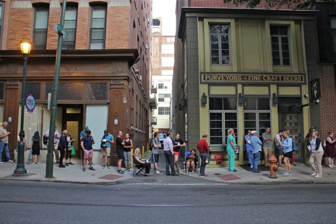 Hundreds wait in a line that began outside the Forrest Theatre on Walnut Street and wrapped around the block onto 11th and Locust streets. for a chance to get tickets to 
