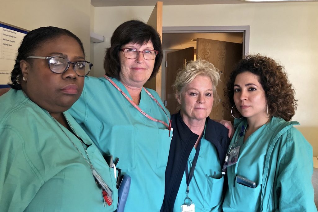 Nurses on the labor and delivery unit at Hahnemann, (from left) Lisa Myers, Claire Byrne, Ann Fitzsimmons, and Sasha Vazquez. (Emily Scott/WHYY)