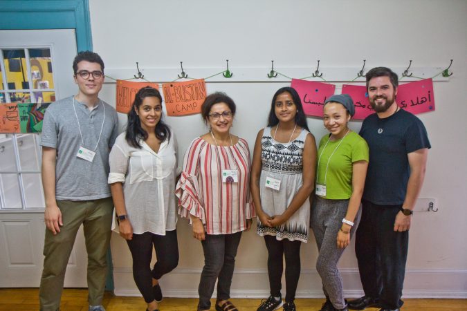 The Al-Bustan camp program staff, including Executive Director Hazami Sayed (third from left).(Kimberly Paynter/WHYY)