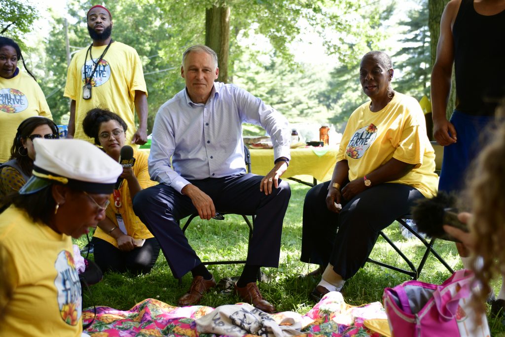 Inslee meets with Philly Trive Democratic presidential hopeful Jay Inslee joins activist with Philly Thrive for a community BBQ, in Fairmount park, on Saturday. (Bastiaan Slabbers for WHYY)
