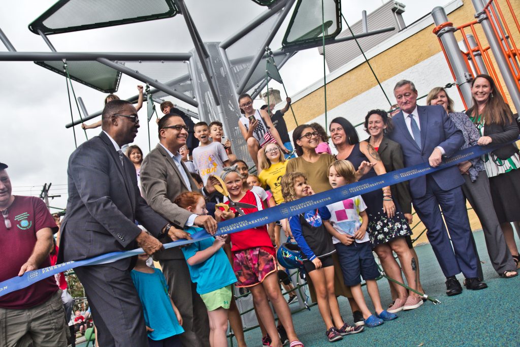 2019 07 23 k paynter rebuild fishtwon rec-5 Government officials and Fishtown children cut the ribbon on Fishtown Recreation Center’s new playground. (Kimberly Paynter/WHYY)