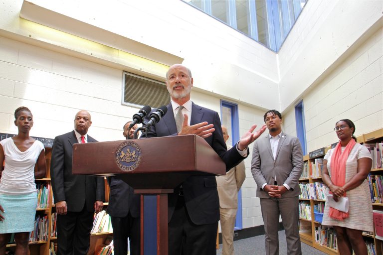 Gov. Tom Wolf visits the newly painted library at Edward Heston School in Philadelphia to announce $4.3 million in state funding for lead paint stabilization at Philadelphia school buildings. (Emma Lee/WHYY)