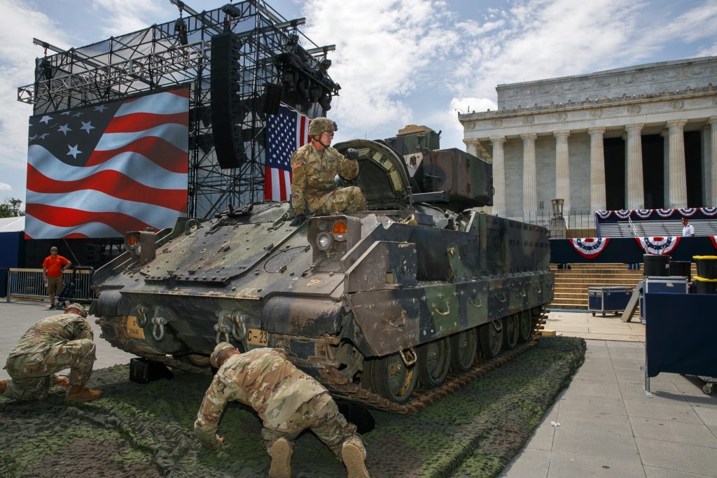 APTOPIX Fourth of July Trump An Army soldier hops out of a Bradley Fighting Vehicle after moving it into place by the Lincoln Memorial, Wednesday, July 3, 2019, in Washington, ahead of planned Fourth of July festivities with President Donald Trump. (Jacquelyn Martin/AP Photo)