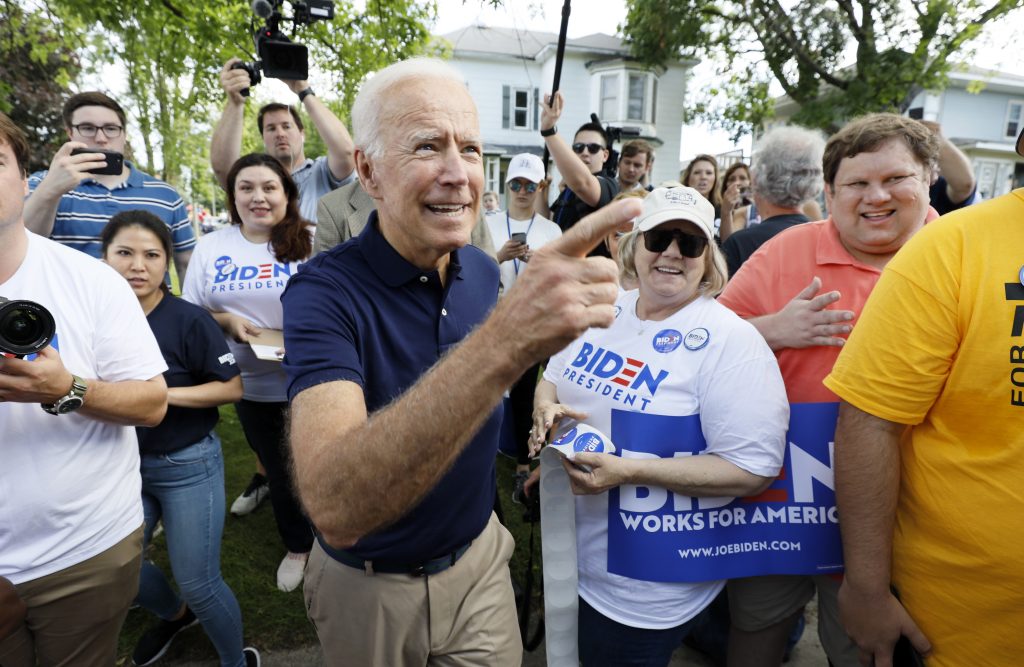 Joe Biden Former vice president and Democratic presidential candidate Joe Biden greets supporters before walking in the Independence Fourth of July parade, Thursday, July 4, 2019, in Independence, Iowa. (Charlie Neibergall/AP Photo)