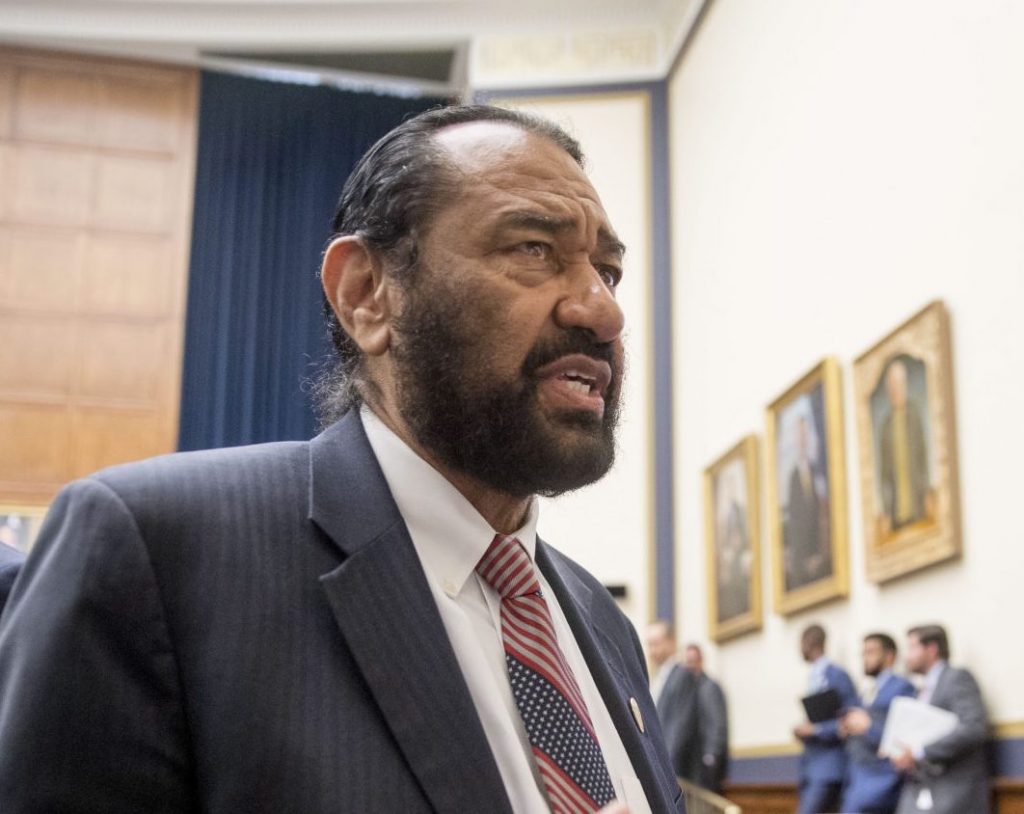 AP_19198617668924-e1563403102643-1920×854 Rep. Al Green, D-Texas, right, speaks to visitors during a break from testimony from David Marcus, CEO of Facebook's Calibra digital wallet service, before a House Financial Services Committee hearing on Facebook's proposed cryptocurrency on Capitol Hill in Washington, Wednesday, July 17, 2019. Green has introduced a resolution in the House to impeach President Donald Trump. (Andrew Harnik/AP Photo)