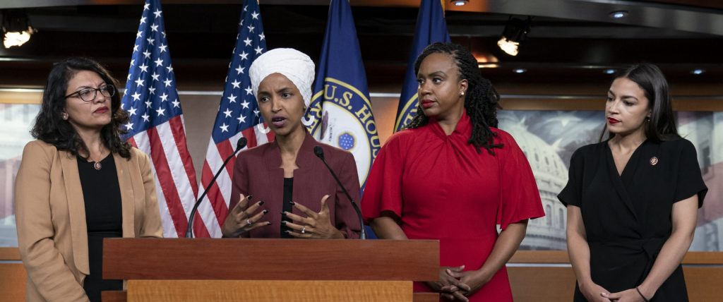 In this Monday, July 15, 2019, file photo, U.S. Rep. Ilhan Omar, D-Minn, (second from left), speaks, as U.S. Reps., (from left), Rashida Tlaib, D-Mich.,Ayanna Pressley, D-Mass., and Alexandria Ocasio-Cortez, D-N.Y., listen, during a news conference at the Capitol in Washington. (J. Scott Applewhite/AP Photo)