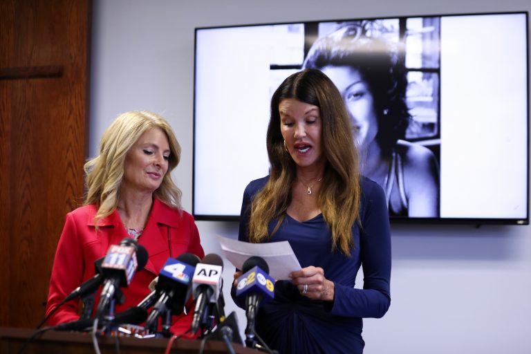 Model Janice Dickinson, (right), speaks at a press conference, Thursday, July 25, 2019, in Los Angeles, announcing a settlement of her defamation lawsuit against comedian Bill Cosby. The deal allows Dickinson to continue to speak out against Cosby. Looking on at left is Dickinson's attorney Lisa Bloom. (Katherine Campione/AP Photo)