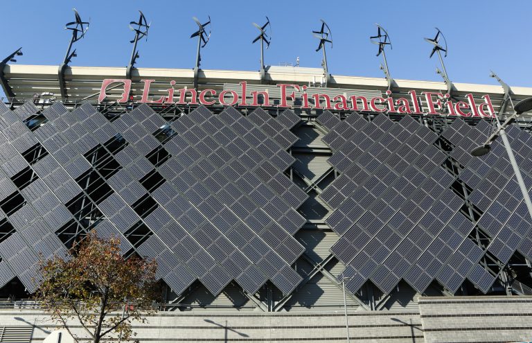 Micro-wind turbines and solar panels installed at Lincoln Financial Field in Philadelphia are pictured Wednesday, November 19, 2014. (Mark Stehle/Invision for NRG/AP Images)