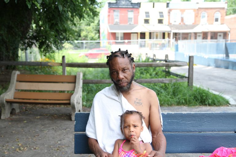Aaron White only heard about the shooting at Overbrook Playground Sunday morning. He describes the shooting as an unfortunate event in what he considers a quiet part of the neighborhood. He took his three-year-old daughter for a swim Sunday afternoon. (Ximena Conde/WHYY)
