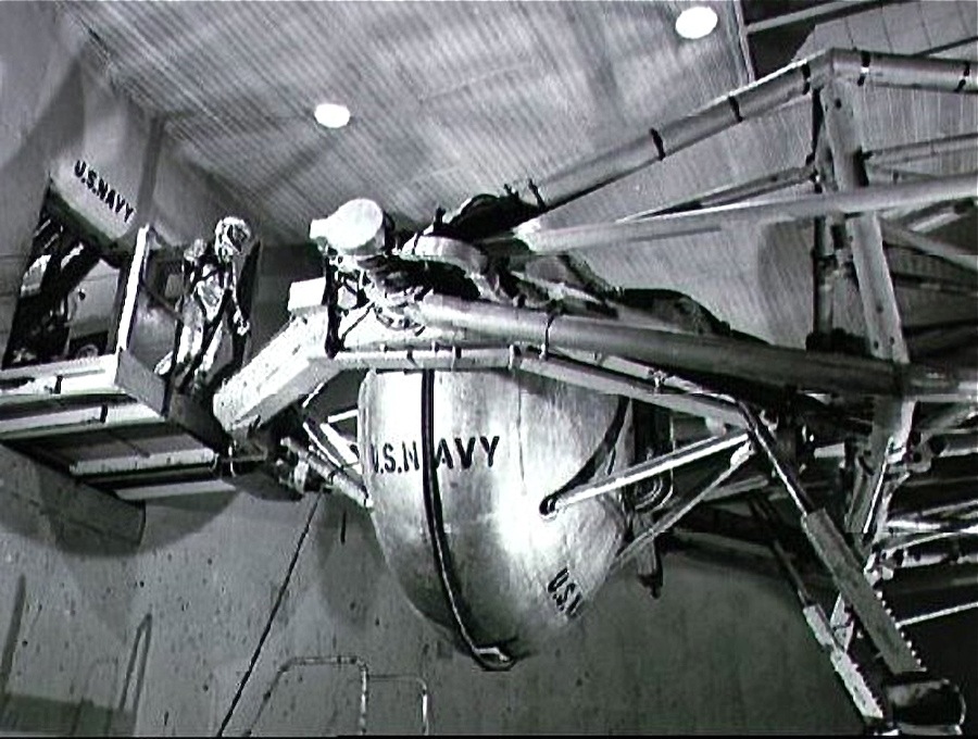 Astronaut Walter M. Schirra Jr. prepares to enter the gondola of a centrifuge which is used to test gravitational stress on astronauts training for space flight. Schirra became the pilot of the Mercury-Atlas 8 six-orbit space mission. Photo taken at Johnsville Naval Air Development Center, Warminster, Pennsylvania. Date Taken:1960-01-01 (NASA)