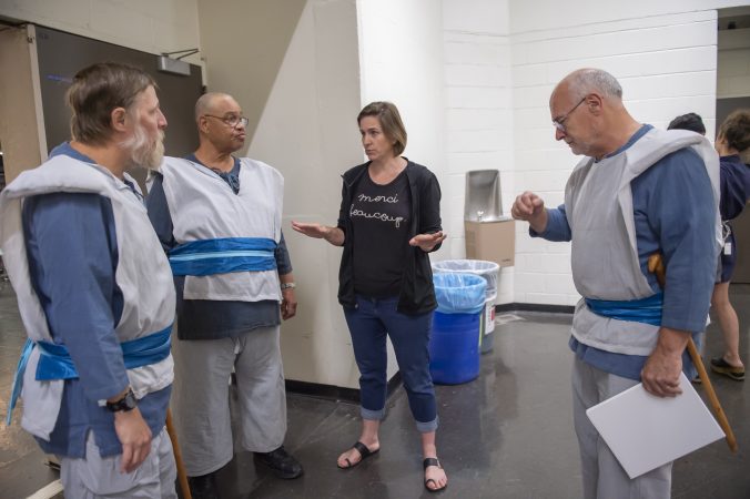 The veterans who portray soldiers in King Lear get final instructions from director Kittson O’Neill; (from left) Nelson Hawthorne, Floyd Crump Jr, O’Neill, and Sheldon Rich. (Jonathan Wilson for WHYY)
