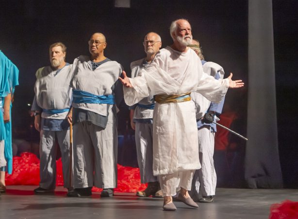 Four veterans portray soldiers in the production of King Lear; (from left) Nelson Hawthorne, Floyd Crump Jr., Sheldon Rich, and John Kearney (partially hidden); King Lear is played by Dan Kern. (Jonathan Wilson for WHYY)
