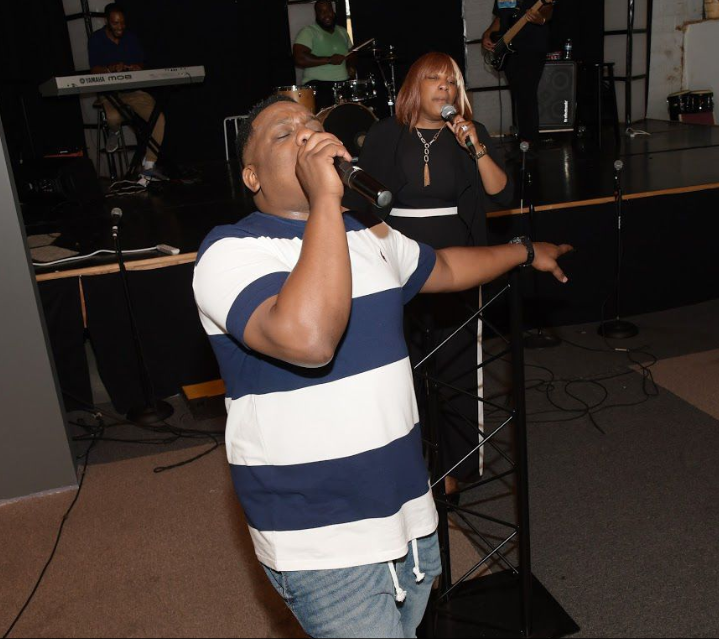 Screen Shot 2019-07-15 at 11.57.54 AM Pastor Chico Robinson of Truth Church Worship Cneter, and first lady Nickie Robinson, sing during church service (Marissa Weekes Mason/The Philadelphia Tribune)