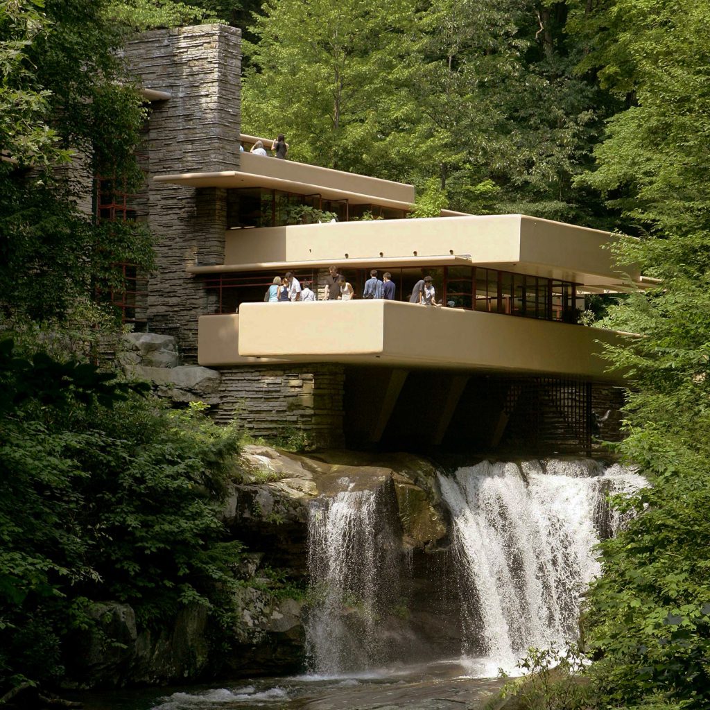 Visitors gather on one of the cantilevered terraces at Fallingwater, a Frank Lloyd Wright design in Pennsylvania. Eight Wright buildings, including Fallingwater, were honored as World Heritage sites by UNESCO, on July 7, 2019. Visitors gather on one of the cantilevered terraces at Fallingwater, a Frank Lloyd Wright design in Pennsylvania. Eight Wright buildings, including Fallingwater, were honored as World Heritage sites by UNESCO, on July 7, 2019. (Keith Srakocic/AP)