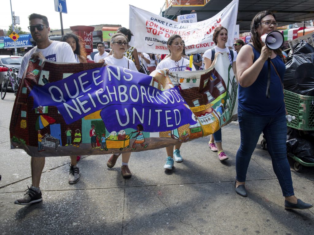 Hundreds of people march in New York in opposition to the Trump administration’s plans to continue with raids to catch immigrants in the country illegally in Queens on Sunday. Hundreds of people march in New York in opposition to the Trump administration's plans to continue with raids to catch immigrants in the country illegally in Queens on Sunday. (Julius Constantine Motal/AP Photo)