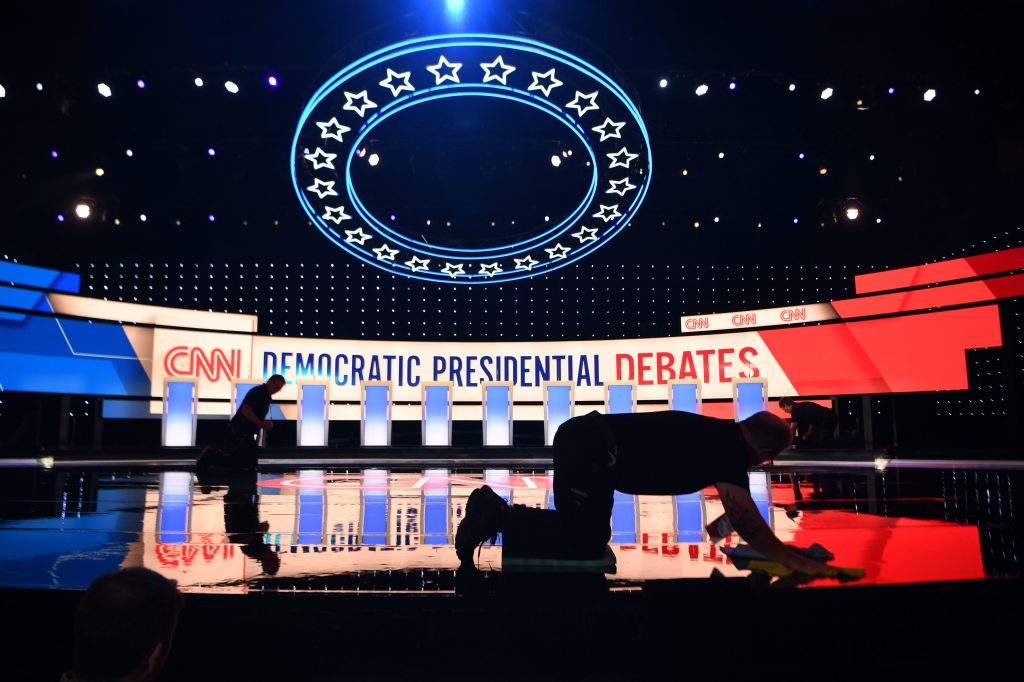 Workers prepare the debate stage at the Fox Theatre in Detroit ahead of Tuesday's Democratic presidential debate. (Jim Watson/AFP/Getty Images)