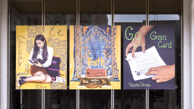immigrantalphabet-creditdanyahenninger-06crop-768×432 Paintings by Northeast High School students in the 'Immigrant Alphabet' art project hanging on MSB in 2017 (Danya Henninger/Billy Penn)