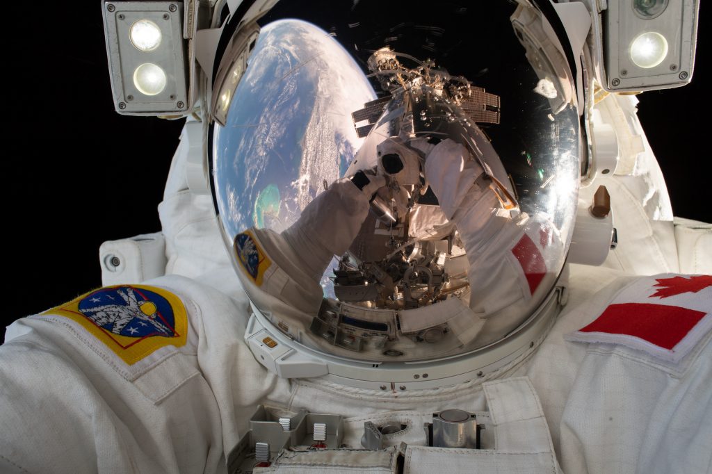 The International Space Station is reflected in the visor of Expedition 59 Flight Engineer David Saint-Jacques of the Canadian Space Agency. The International Space Station is reflected in the visor of Expedition 59 Flight Engineer David Saint-Jacques of the Canadian Space Agency. (NASA)