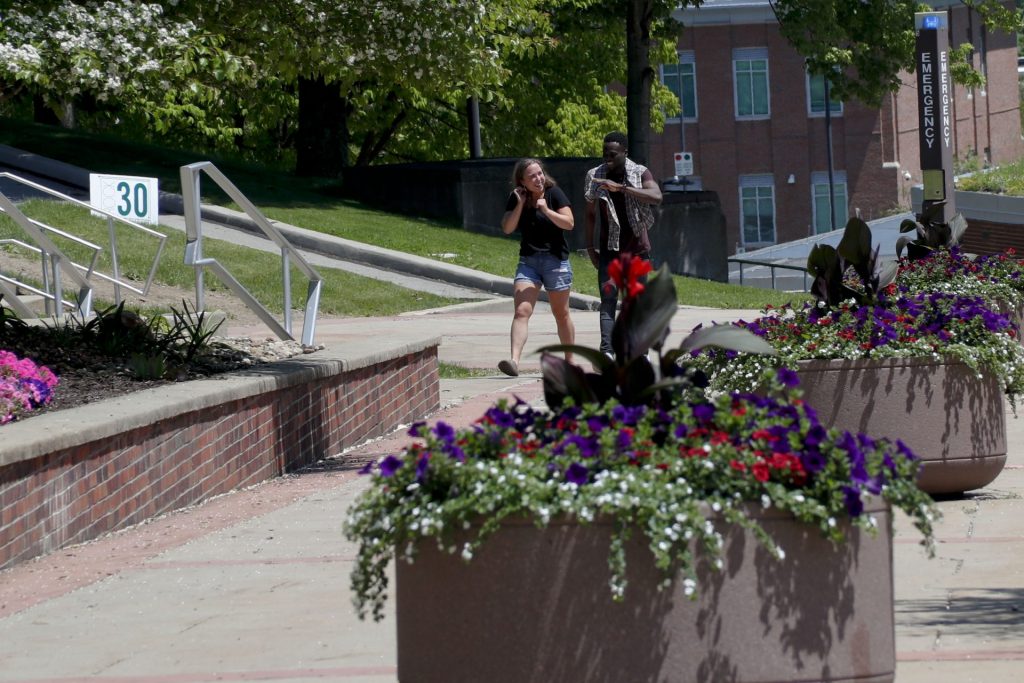 slippery_rock1-1920×1280 In this photo from Friday, May 24, 2019, visitors walk through the campus of Slippery Rock University in Slippery Rock, Pa. (Keith Srakocic/AP Photo)