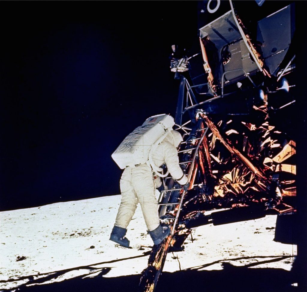 APOLLO 11 LUNAR LANDING Astronaut Edwin E. Aldrin, Jr., lunar module pilot, descends steps of Lunar Module ladder as he prepares to walk on the moon, July 20, 1969. This picture was taken by astronaut Neil A. Armstrong, Commander