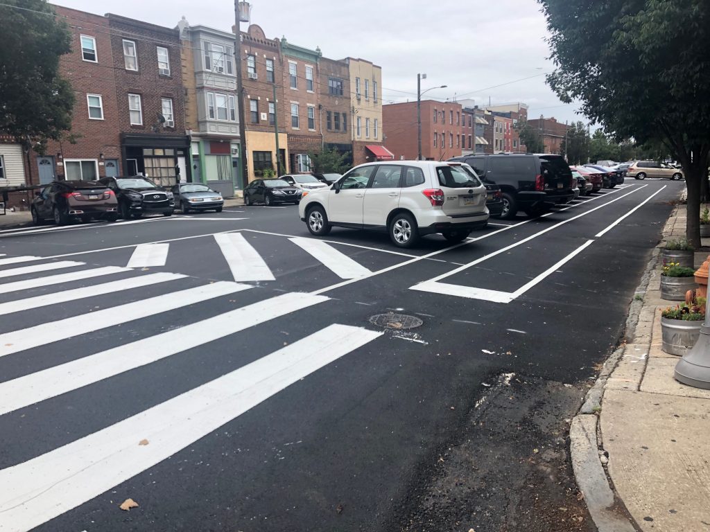 11th street Philadelphia recently repaved South 11th Street, creating new parking-protected bike lanes, as seen here. (Darryl Murphy/WHYY)