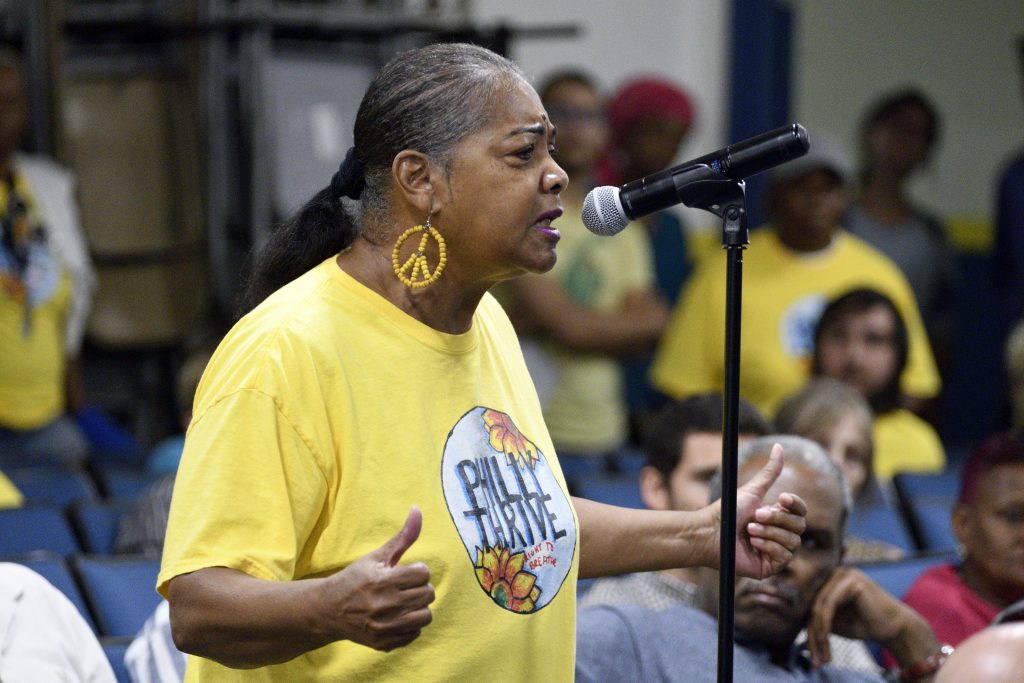 Fence-line resident Sylvia Bennett, with Philly Thrive speaks during the first public meeting of the Philadelphia Energy Solutions refinery advisory group   (Bastiaan Slabbers for WHYY)